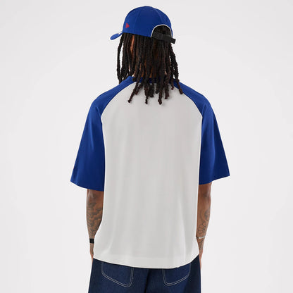 The model is wearing this MLB LA Dodgers Boxy T-Shirt in white. 2