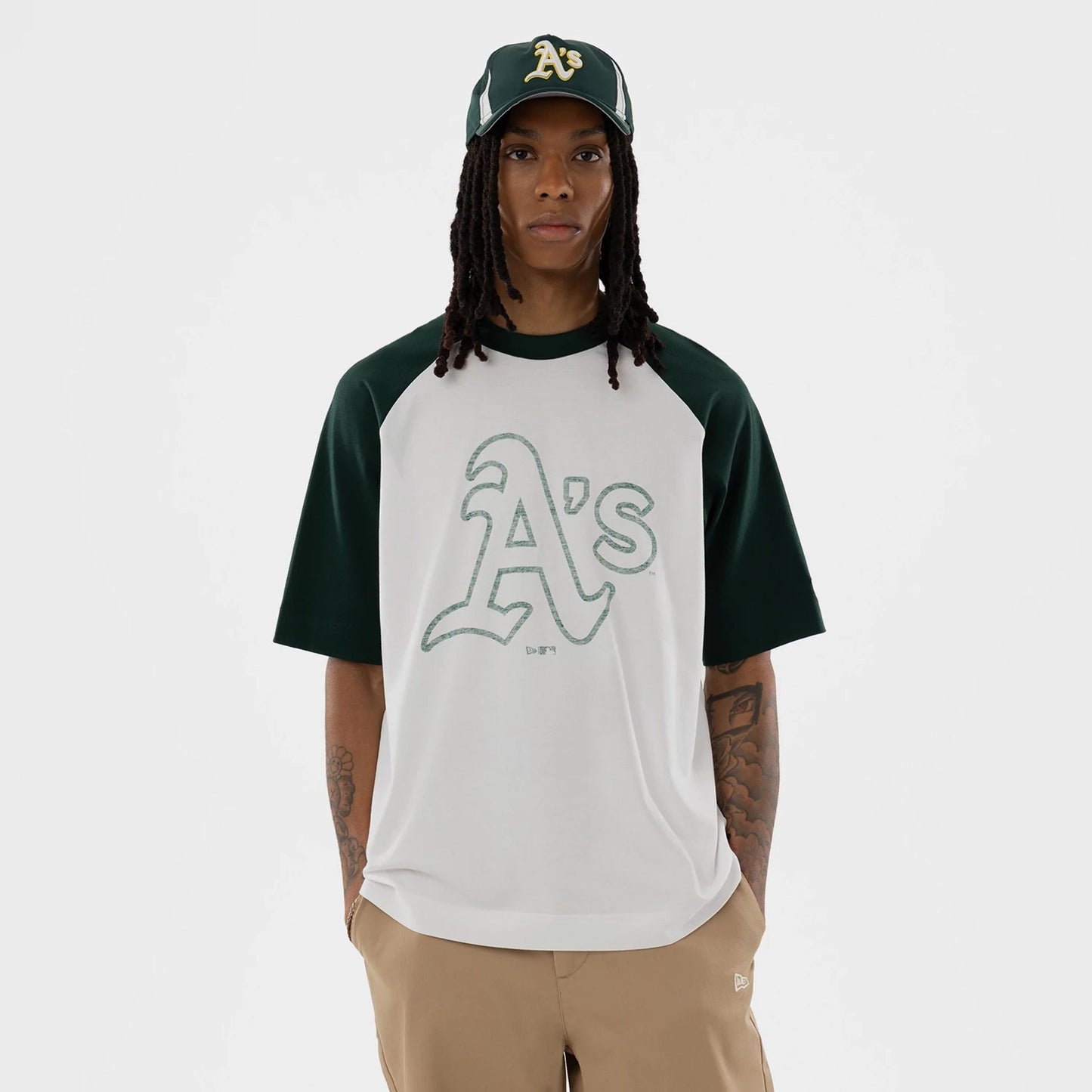 The model is wearing this MLB Athletics Boxy T-Shirt in white. 1