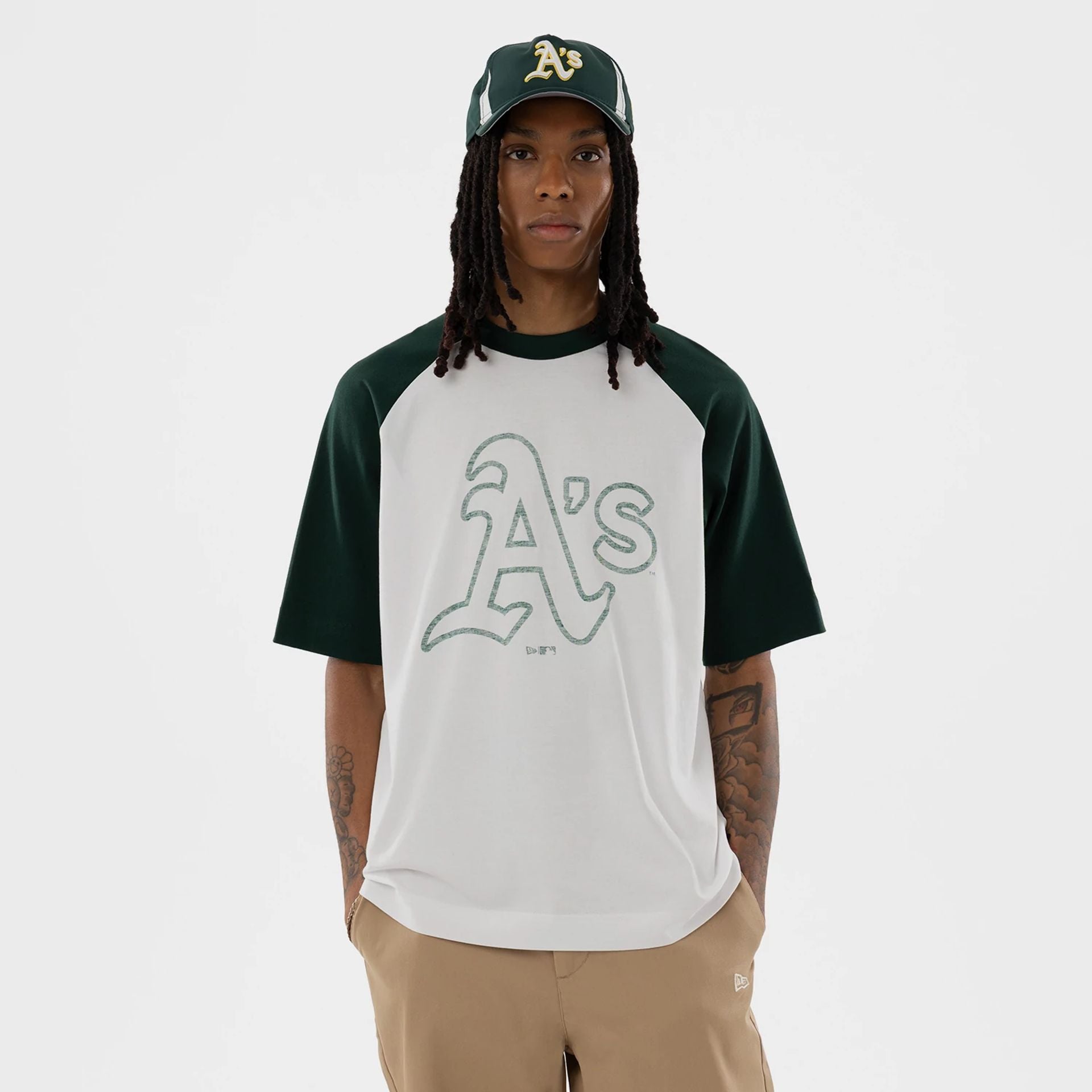 The model is wearing this MLB Athletics Boxy T-Shirt in white. 1
