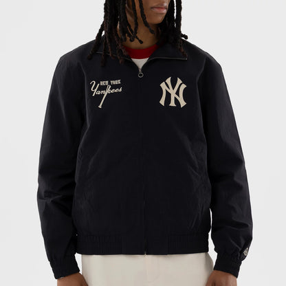 The model is wearing this MLB New York Yankees Sports Jacket in navy. 6
