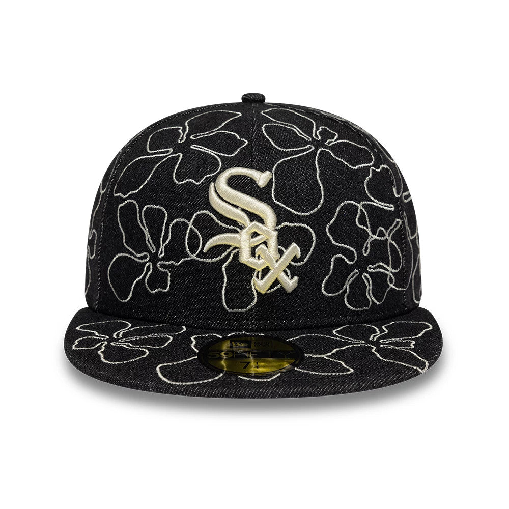 Chicago White Sox MLB Floral Denim Black New Era 59FIFTY Fitted Cap, front view showing the prominent white embroidered team logo on the black floral denim front panels, with a flat visor and a gold 59FIFTY size sticker on top.