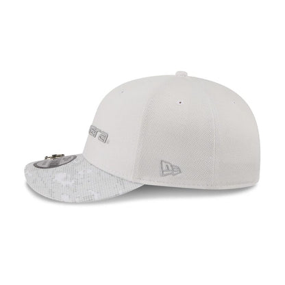 Pictured is this New Era Golf 9FIFTY Snapback cap in white. 5