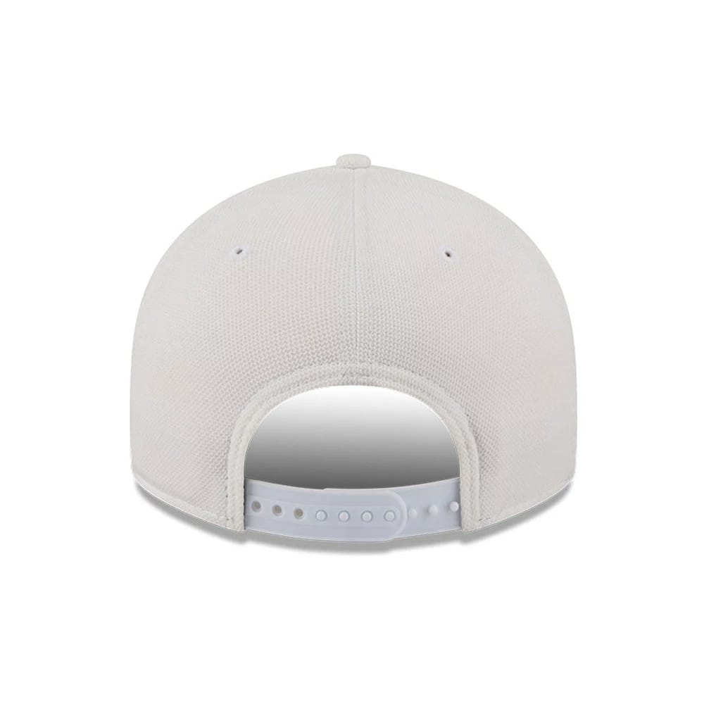 Pictured is this New Era Golf 9FIFTY Snapback cap in white. 7
