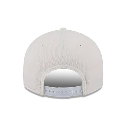 Pictured is this New Era Golf 9FIFTY Snapback cap in white. 7