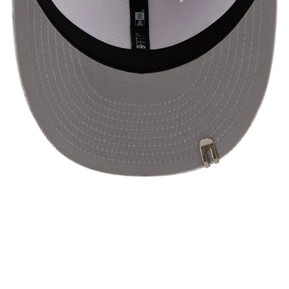 Pictured is this New Era Golf 9FIFTY Snapback cap in white. 2