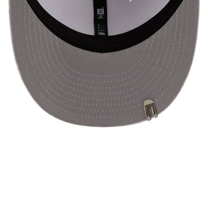 Pictured is this New Era Golf 9FIFTY Snapback cap in white. 2