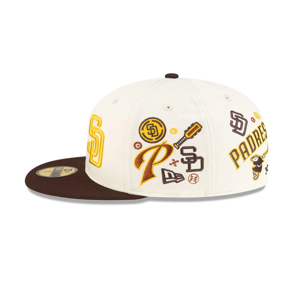 All Over MLB Mexico City Series 2026 White New Era 59FIFTY Fitted Cap, side view showing the yellow and brown embroidered logos including SD, 'Padres', and various baseball-themed graphics on the white crown, with a brown flat visor.