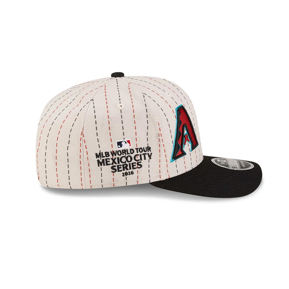 Pictured is this MLB Mexico City Series 2026 MLB Dueling League Logos 9SEVENTY Stretch Snap Adjustable cap in light beige. 5