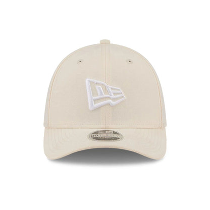 Pictured is this New Era Flag 39THIRTY M-Crown Stretch Fit cap in light beige. 3