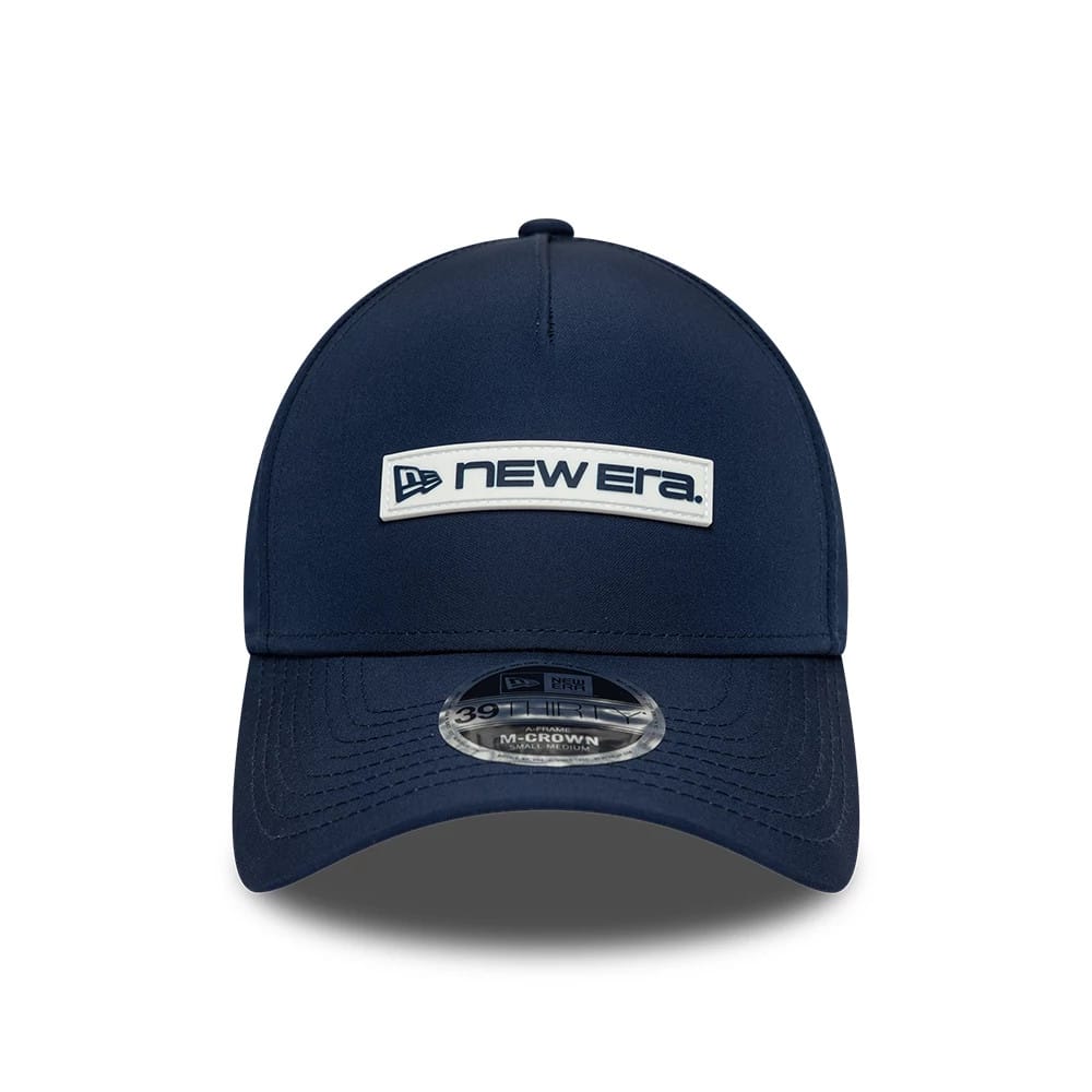 Pictured is this New Era Rubber Patch 39THIRTY M-Crown A-Frame Stretch Fit cap in dark blue. 3