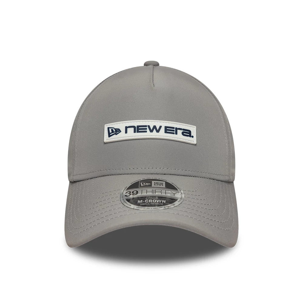 Pictured is this New Era Rubber Patch 39THIRTY M-Crown A-Frame Stretch Fit cap in grey. 2