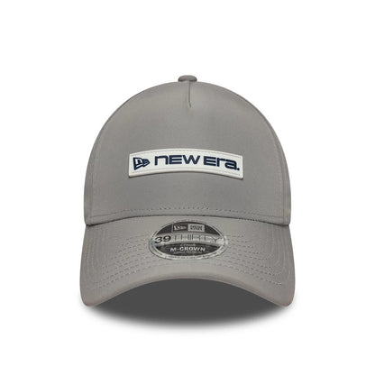 Pictured is this New Era Rubber Patch 39THIRTY M-Crown A-Frame Stretch Fit cap in grey. 2