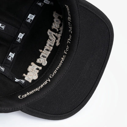 Pictured is this New Era X Hermanos Koumori Running Camper cap in black. 6