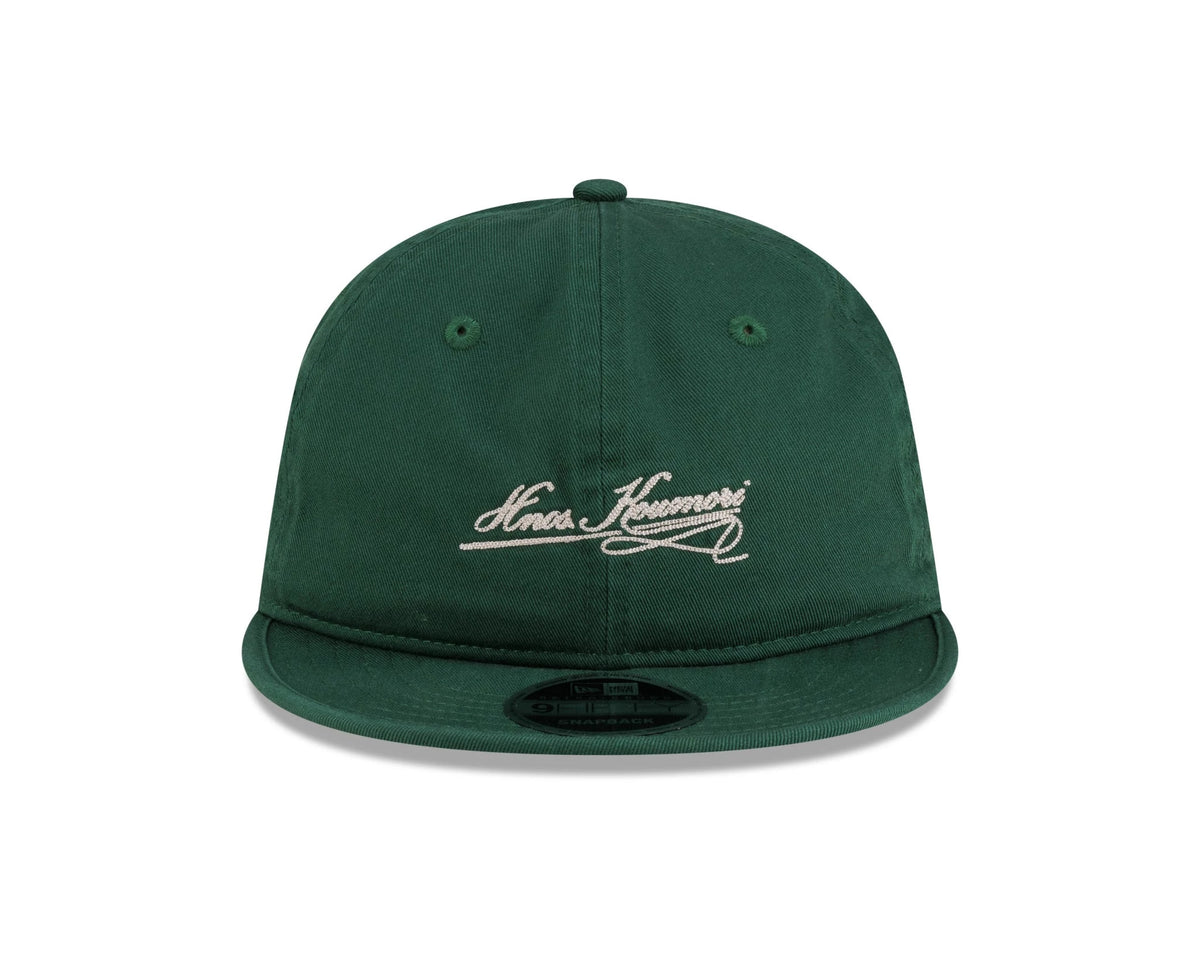 Pictured is this New Era X Hermanos Koumori Cursive Retro Crown 9FIFTY cap in green. 2