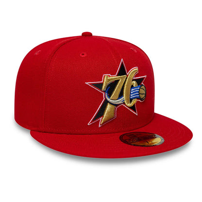 Philadelphia 76ers NBA Hardwood Classic Red New Era 59FIFTY Fitted Cap, front view showing a large, multicolour embroidered 76ers logo on the front panel, with a matching red flat visor and a gold 59FIFTY size sticker on the visor.