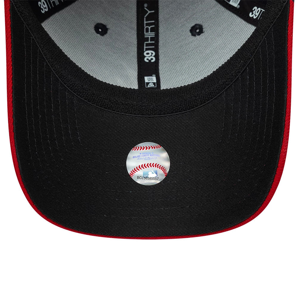 Atlanta Braves MLB Classic Navy New Era 39THIRTY Stretch Fit Cap, inside view showing the grey sweatband and black taping with the 39THIRTY logo, and a prominent round holographic sticker on the black undervisor.