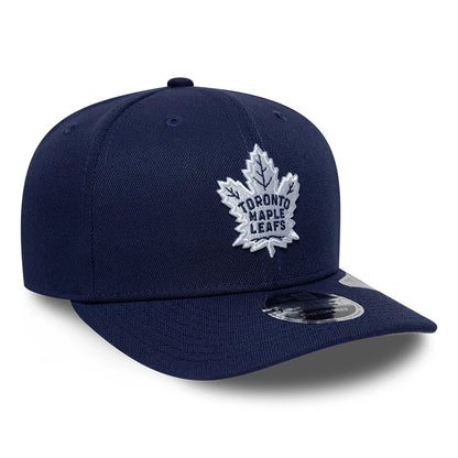 Pictured is this NHL Team Toronto Maple Leafs 9SEVENTY Stretch Snap cap in navy. 4