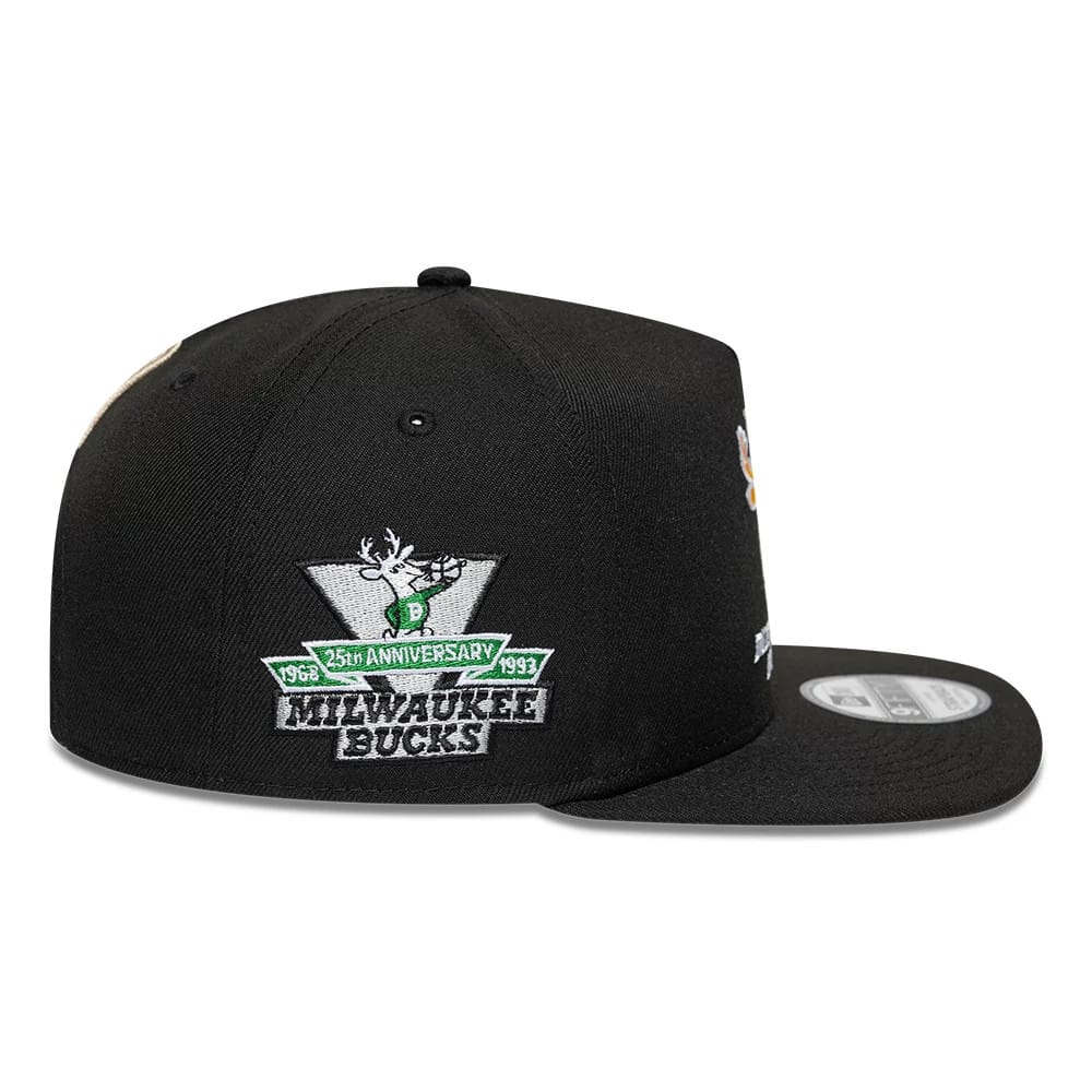 Pictured is this NBA Hardwood Classic Milwaukee Bucks 9FIFTY A-Frame Snapback cap in black. 7