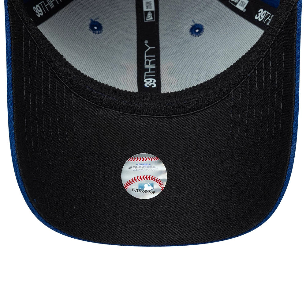 New York Mets MLB Classic Blue New Era 39THIRTY Stretch Fit Cap, inside view showing the black sweatband with 39THIRTY taping, blue eyelets against a light grey interior, and an MLB sticker centred on the black underside of the visor.