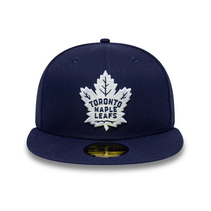 Pictured is this NHL Basic Toronto Maple Leafs 59FIFTY Fitted cap in navy. 3