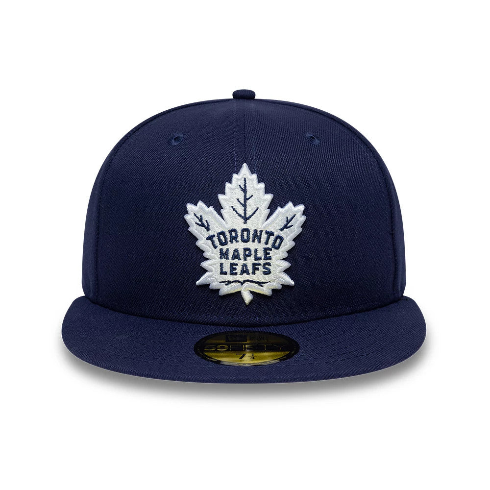 Pictured is this NHL Basic Toronto Maple Leafs 59FIFTY Fitted cap in navy. 3