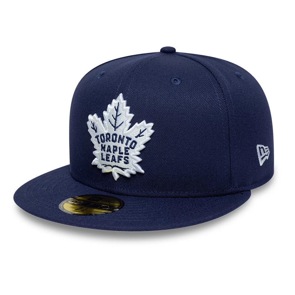 Pictured is this NHL Basic Toronto Maple Leafs 59FIFTY Fitted cap in navy. 1
