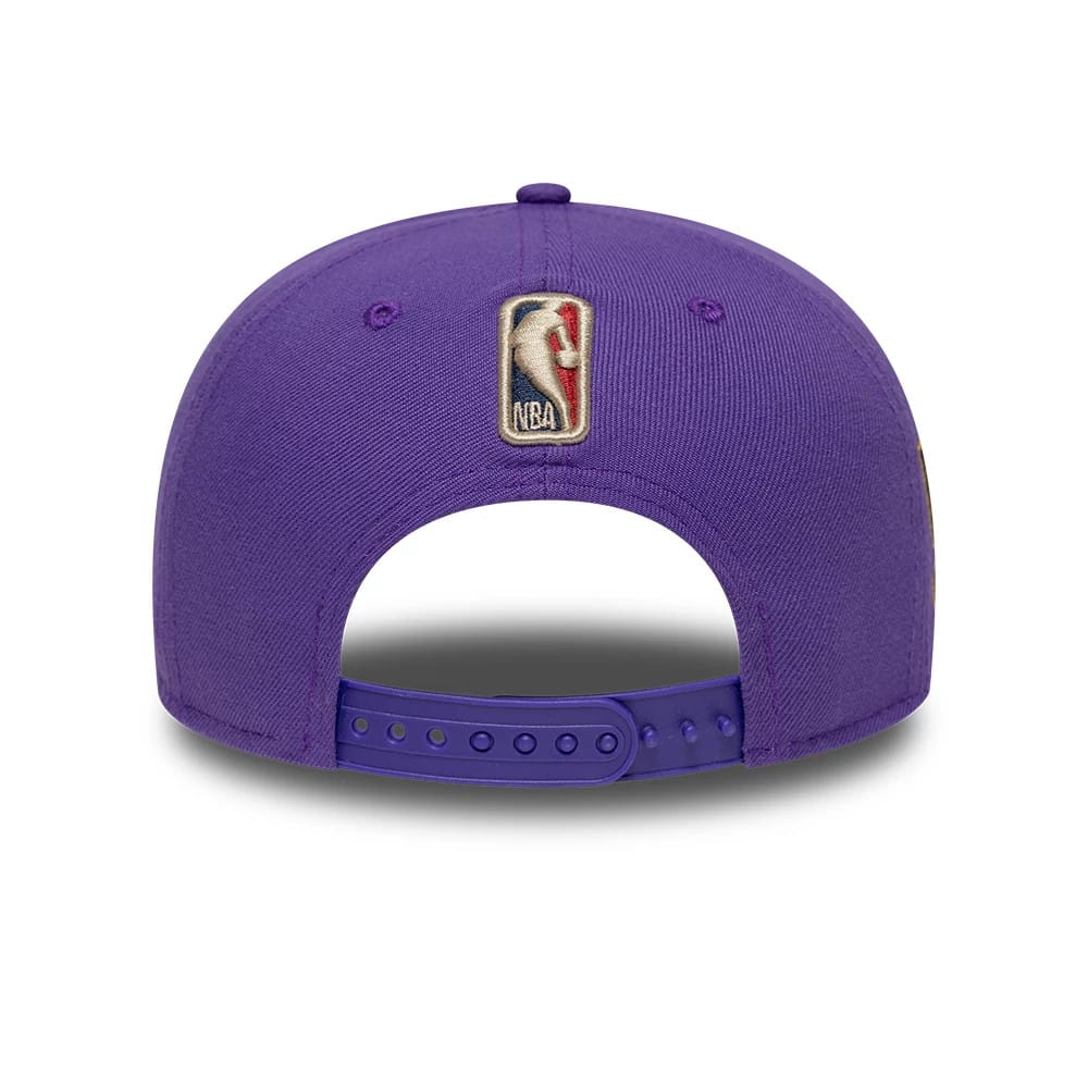 Pictured is this NBA Hardwood Classic LA Lakers 9FIFTY A-Frame Snapback cap in purple. 6