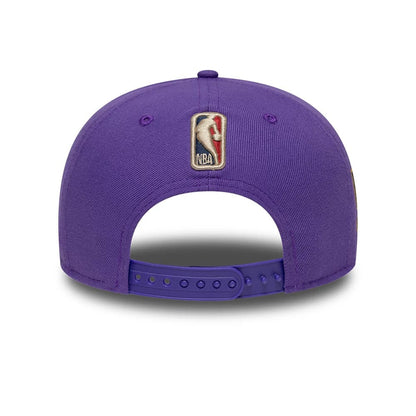 Pictured is this NBA Hardwood Classic LA Lakers 9FIFTY A-Frame Snapback cap in purple. 6