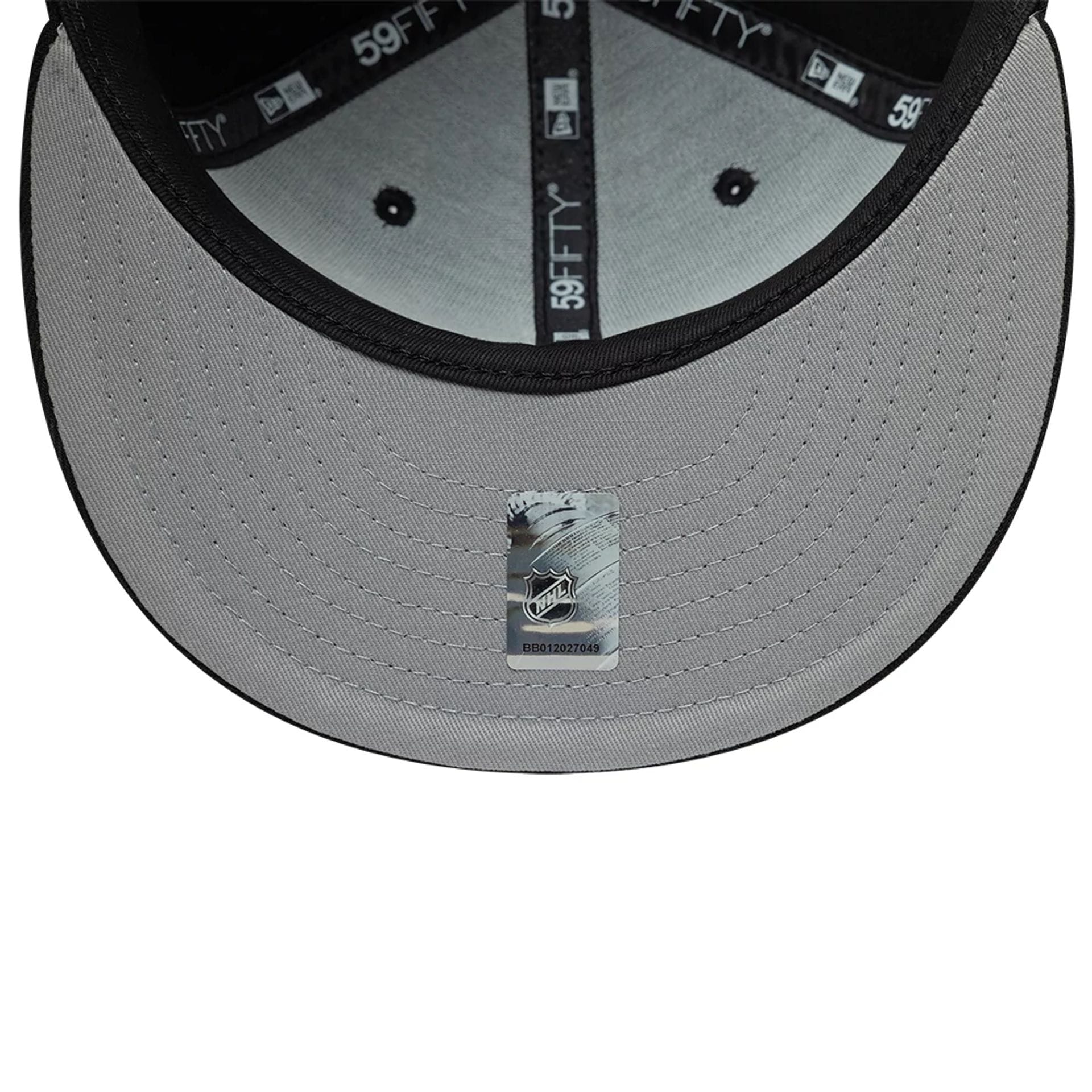 Pictured is this NHL Basic Dallas Stars 59FIFTY Fitted cap in Black. 2