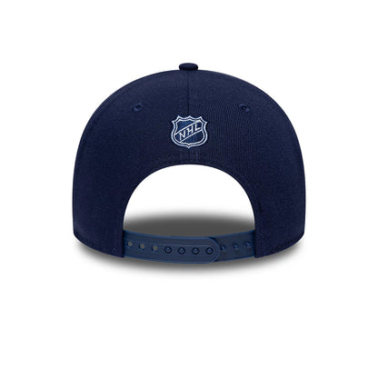 Toronto Maple Leafs NHL Team Navy New Era 9FORTY M-Crown Adjustable Cap, rear view showing the white embroidered NHL shield logo at the centre back, with a navy adjustable strap and matching navy eyelets on the structured crown.