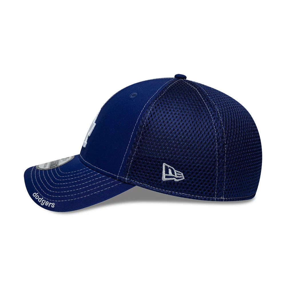 LA Dodgers MLB Neo Dark Blue New Era 39THIRTY Stretch Fit Cap, side view showing the white New Era flag logo embroidered on the mesh back panels, with the curved visor featuring the Dodgers script on the left and the 39THIRTY size sticker underneath.