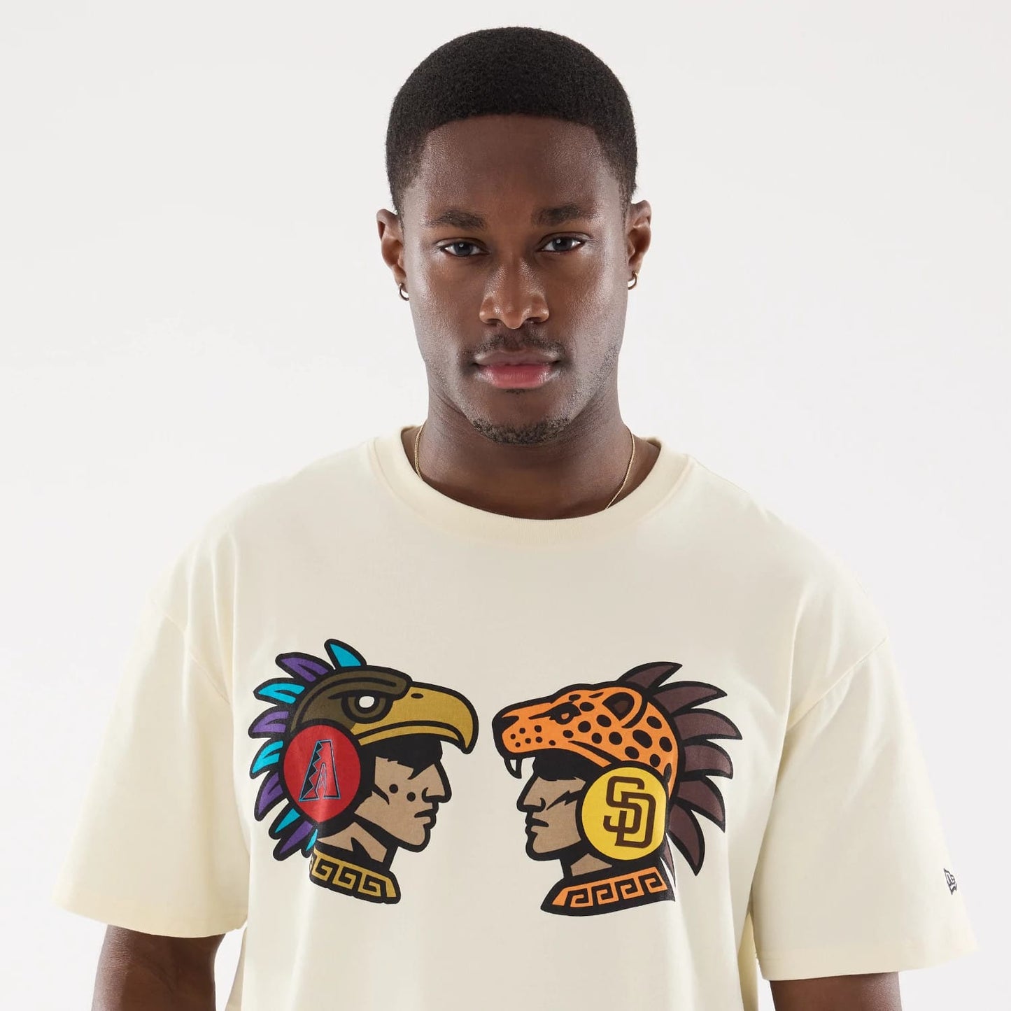 The model is wearing this MLB Mexico City Series 2026 Clash MLB Dueling Logo T-Shirt in Cream 6