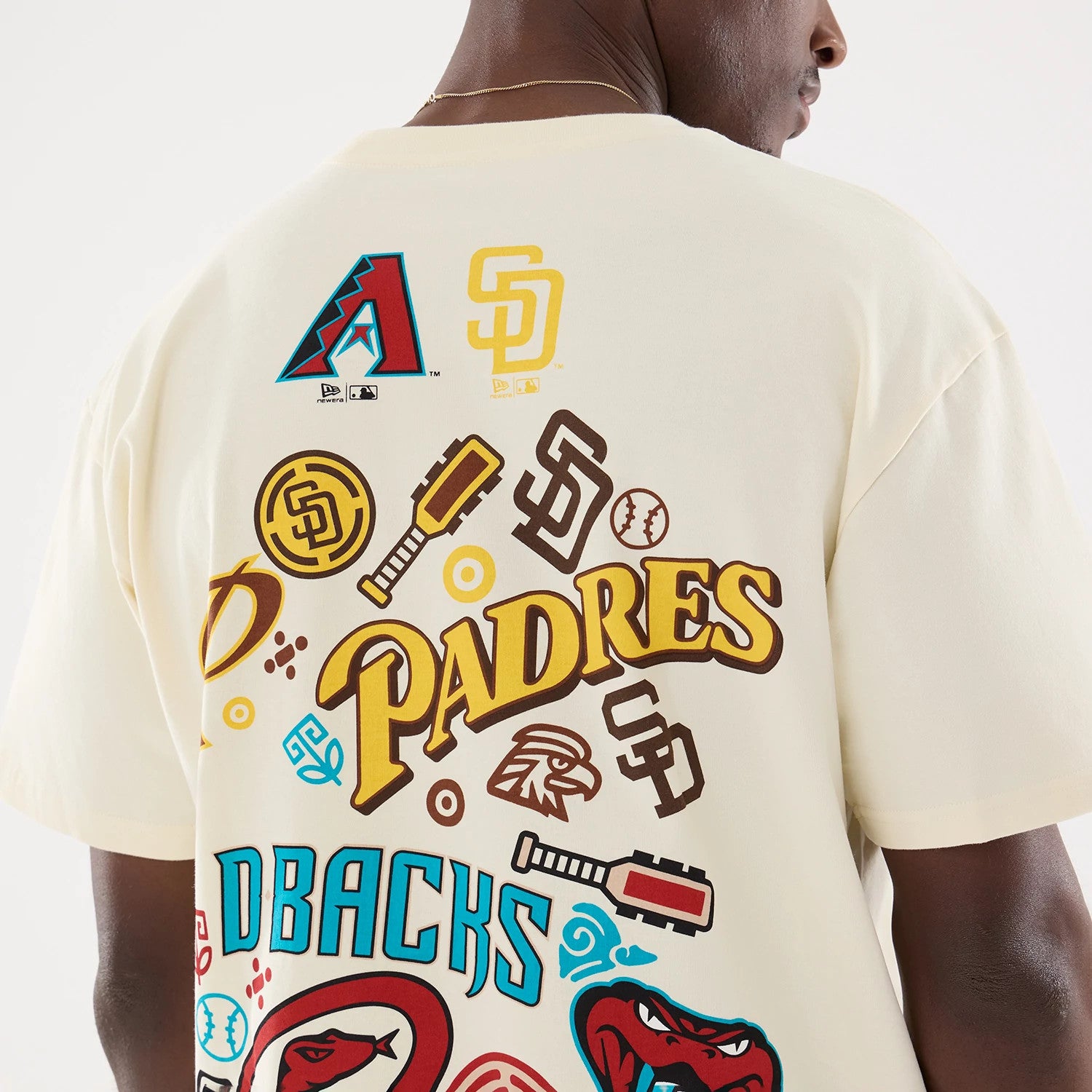 The model is wearing this MLB Mexico City Series 2026 Script Dueling Logo T-Shirt in Cream. 4