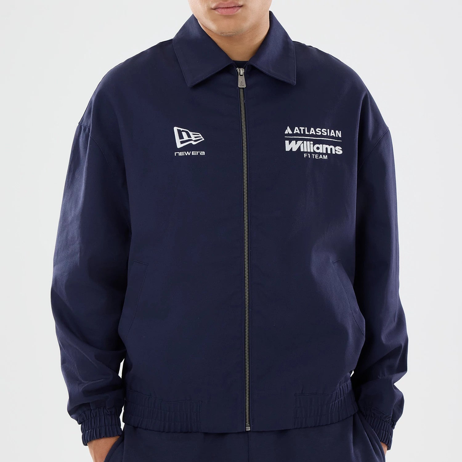 The model is wearing this Williams GB Race Special Collared Jacket in navy. 5