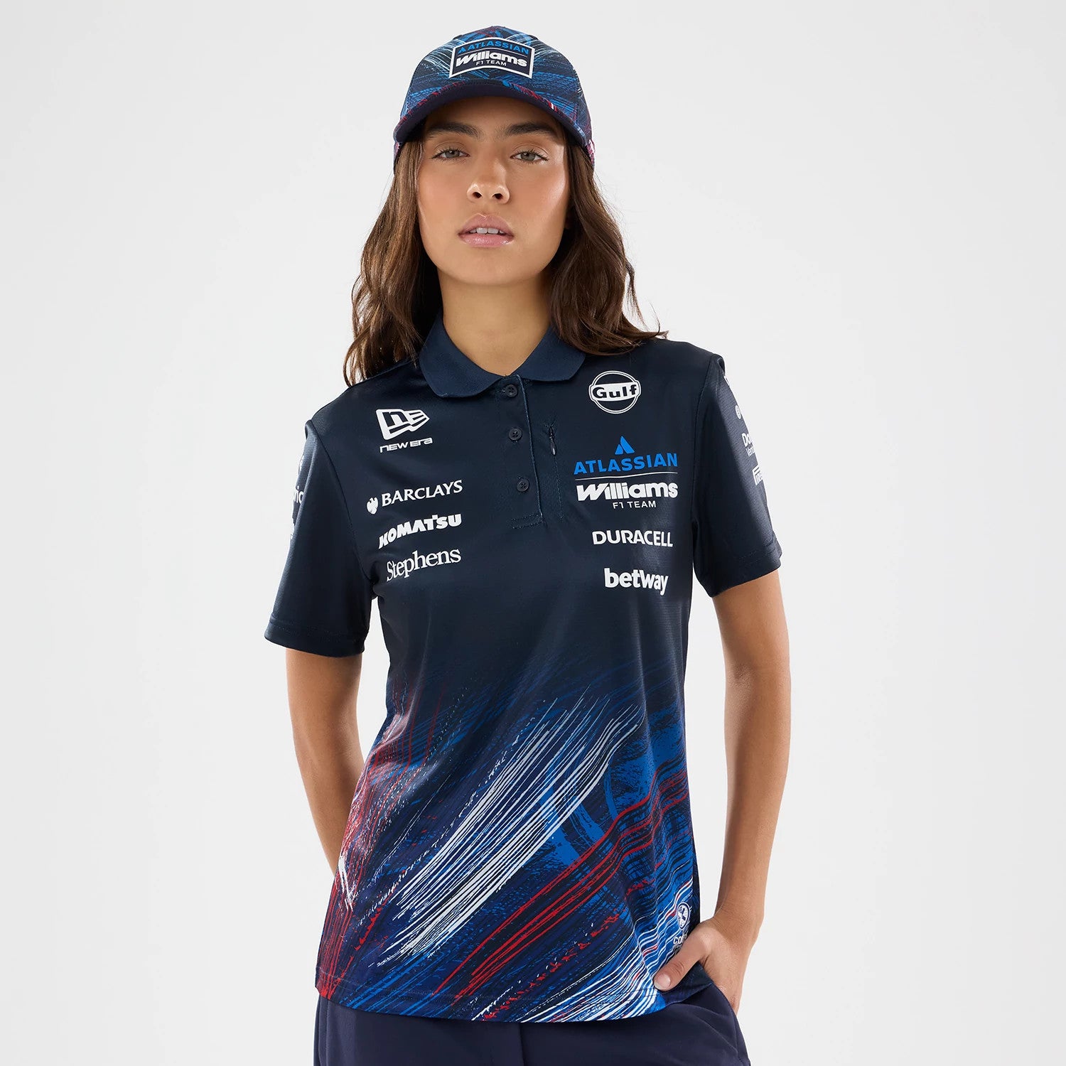 The model is wearing this Womens Williams GB Race Special Tech Polo T-Shirt  in navy. 1