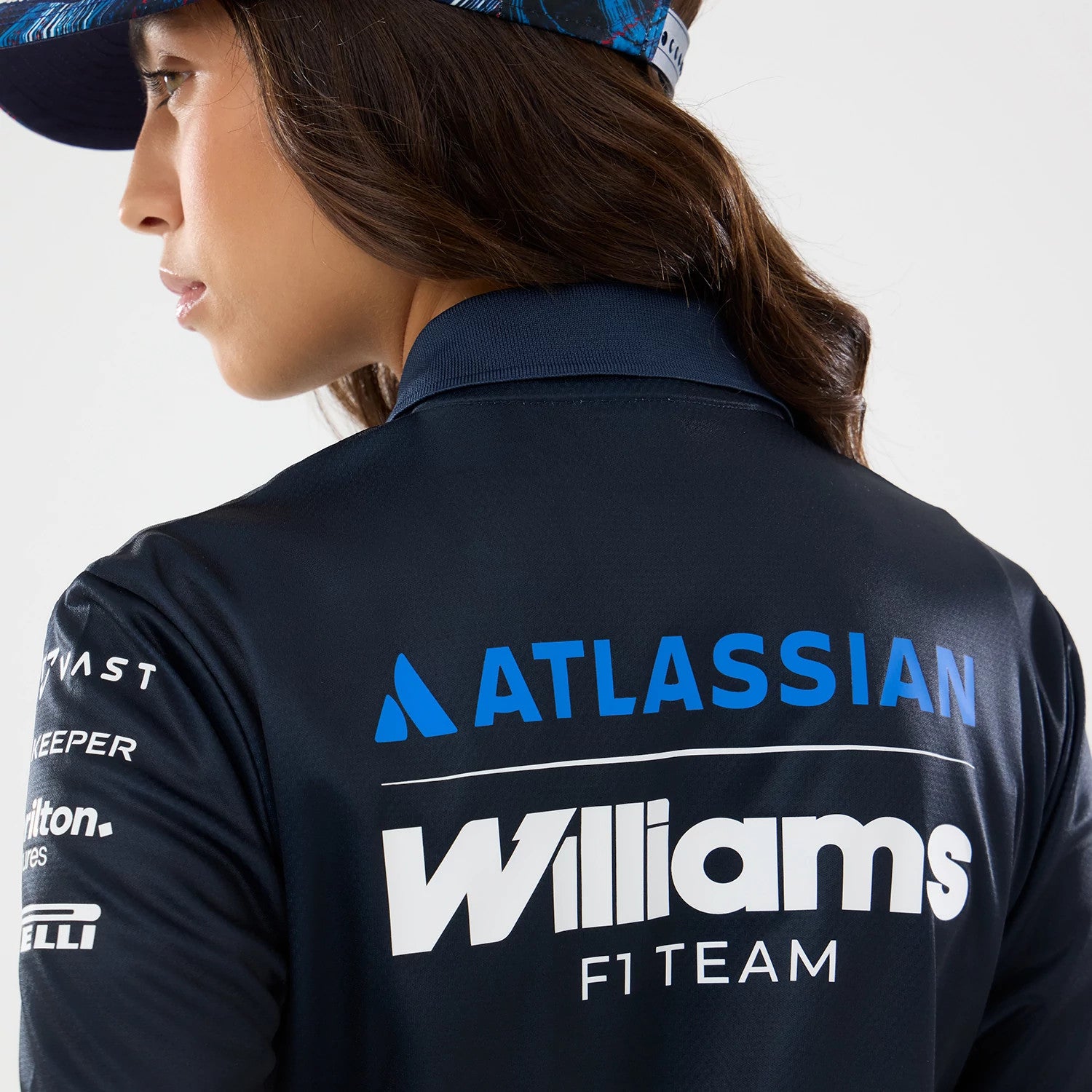 The model is wearing this Womens Williams GB Race Special Tech Polo T-Shirt  in navy. 7