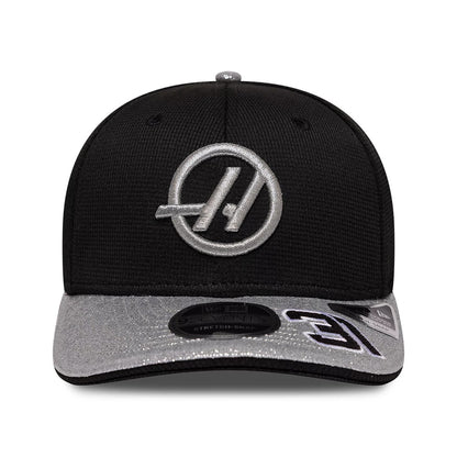 Pictured is this Esteban Ocon Vegas Race Special TGR Haas F1 9SEVENTY Stretch Snap cap in black. 2