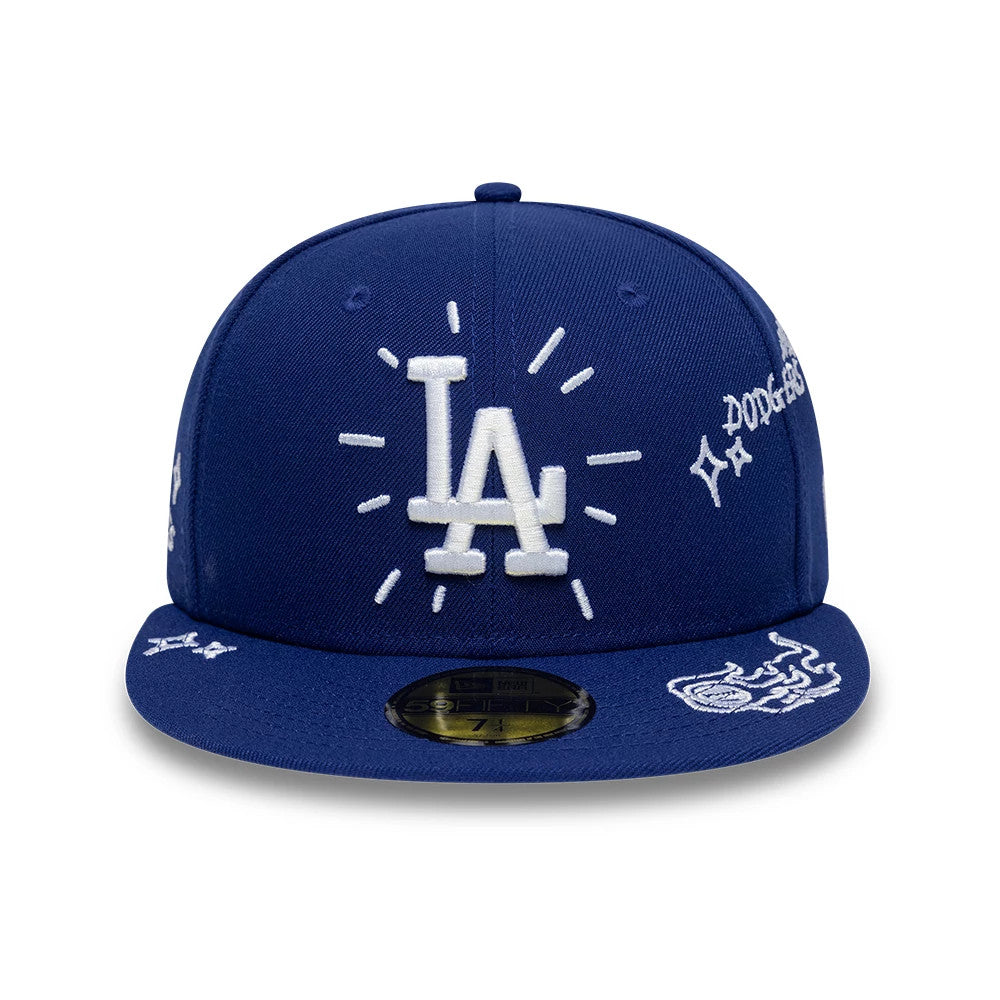 LA Dodgers MLB Scribble Dark Blue New Era 59FIFTY Fitted Cap, front view showing the white embroidered LA logo with radiating lines on the structured dark blue crown, embroidered graphics on the visor, and a gold 59FIFTY size sticker.