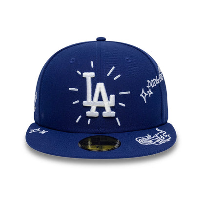 LA Dodgers MLB Scribble Dark Blue New Era 59FIFTY Fitted Cap, front view showing the white embroidered LA logo with radiating lines on the structured dark blue crown, embroidered graphics on the visor, and a gold 59FIFTY size sticker.