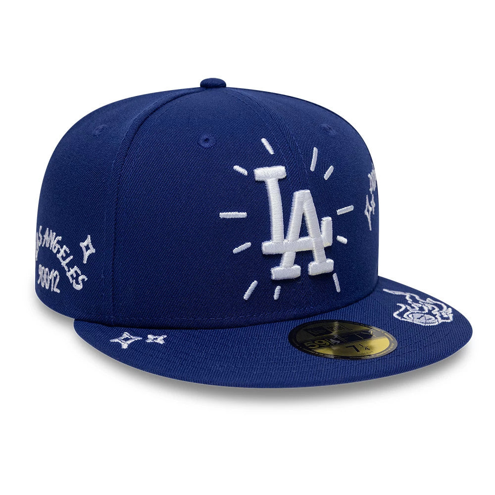 Pictured is this MLB Scribble LA Dodgers 59FIFTY Fitted cap in dark blue. 3