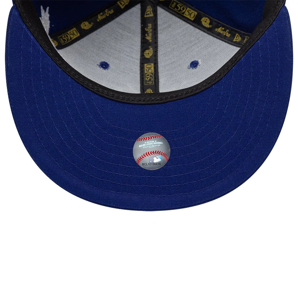 LA Dodgers MLB Scribble Dark Blue New Era 59FIFTY Fitted Cap, inside view showing dark blue undervisor, gold New Era and 59FIFTY taping, and grey sweatband with blue vent eyelets, complete with a central MLB authentication sticker.