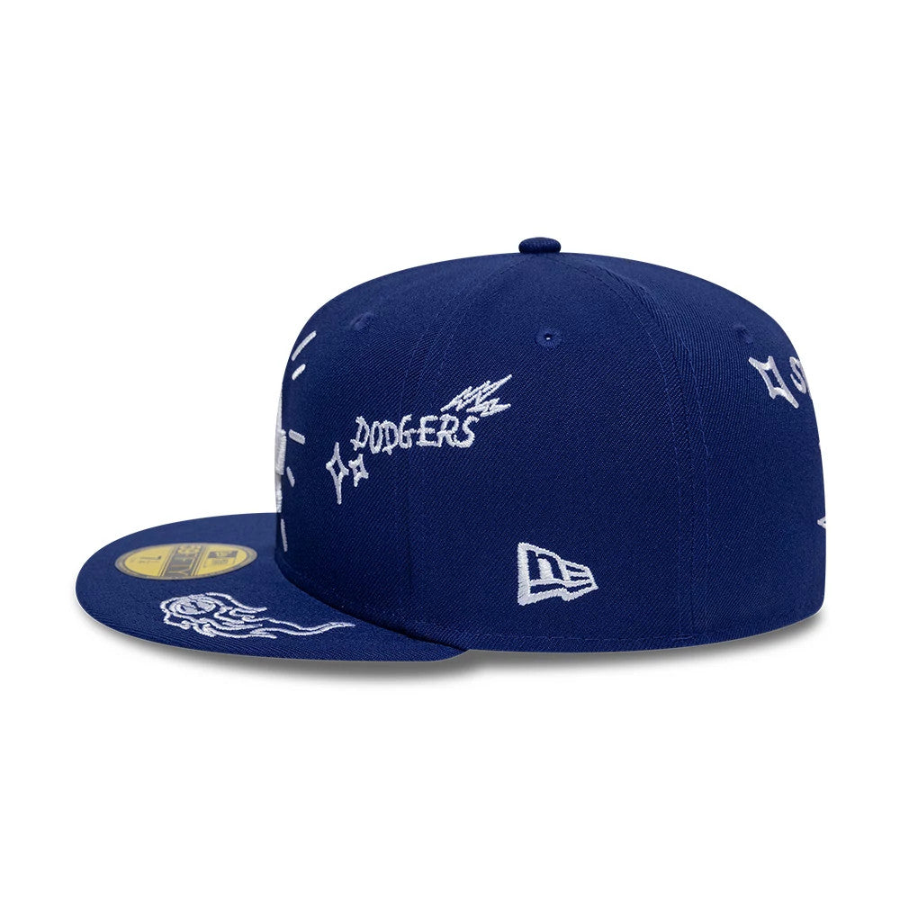 LA Dodgers MLB Scribble Dark Blue New Era 59FIFTY Fitted Cap, side view showing a collection of white embroidered scribble designs including the Dodgers wordmark, a New Era flag logo on the left side.