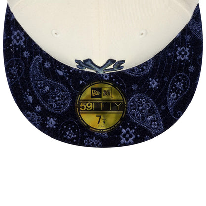New York Yankees MLB Paisley Visor Cream New Era 59FIFTY Fitted Cap, front view showing a dark blue paisley patterned visor with a gold 59FIFTY size sticker, cream structured crown, and raised dark blue Yankees logo embroidery on the front panel.