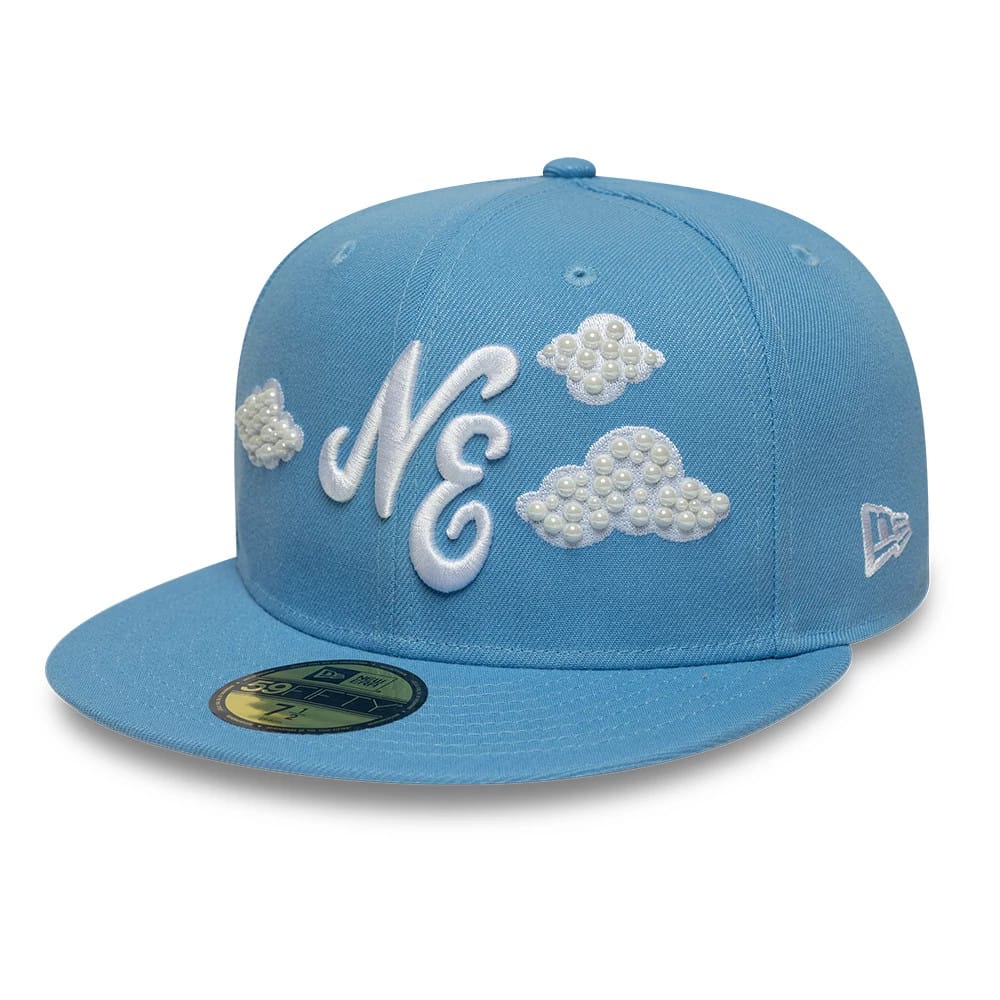 Pictured is this New Era Faux Pearl 59FIFTY Fitted cap in pastel blue. 1