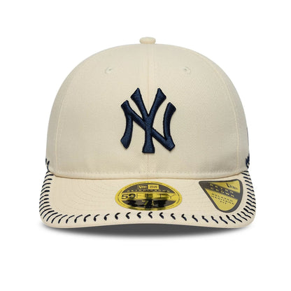 Pictured is this MLB Baseball Stitch New York Yankees Retro Crown 59FIFTY Fitted cap in Cream. 2
