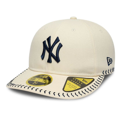 Pictured is this MLB Baseball Stitch New York Yankees Retro Crown 59FIFTY Fitted cap in Cream. 1