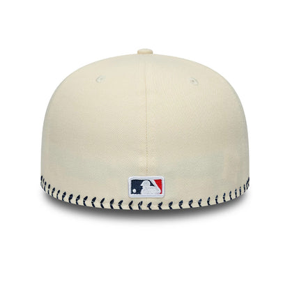 Pictured is this MLB Baseball Stitch New York Yankees Retro Crown 59FIFTY Fitted cap in Cream. 4