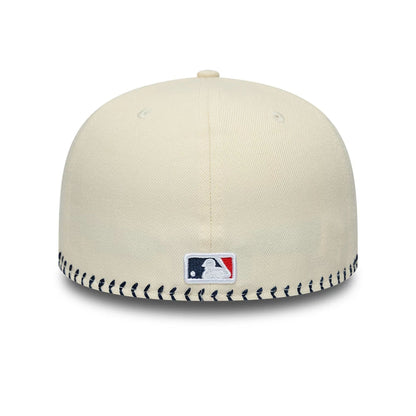 Pictured is this MLB Baseball Stitch New York Yankees Retro Crown 59FIFTY Fitted cap in Cream. 4