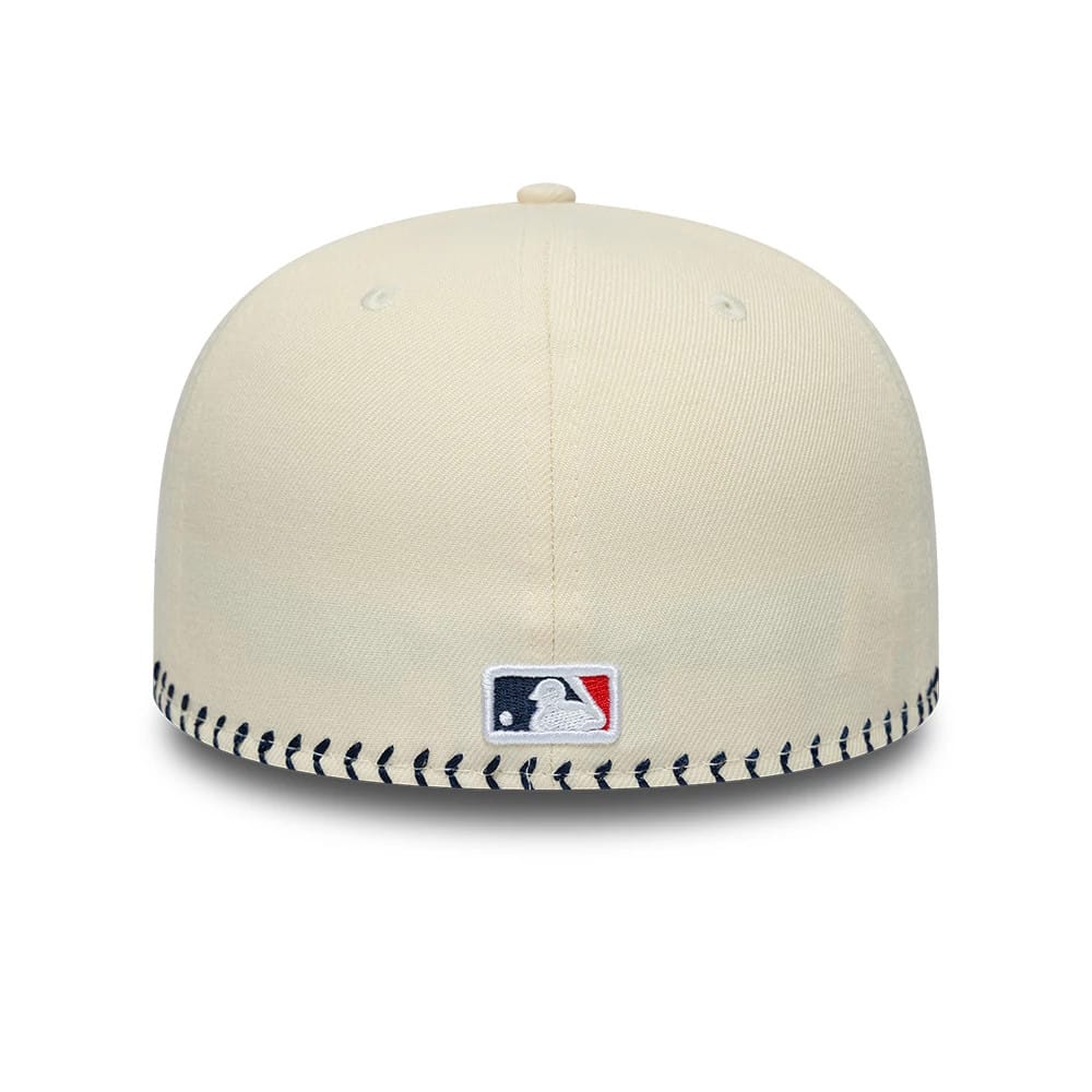 Pictured is this MLB Baseball Stitch New York Yankees Retro Crown 59FIFTY Fitted cap in Cream. 4