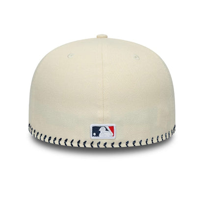 Pictured is this MLB Baseball Stitch New York Yankees Retro Crown 59FIFTY Fitted cap in Cream. 4